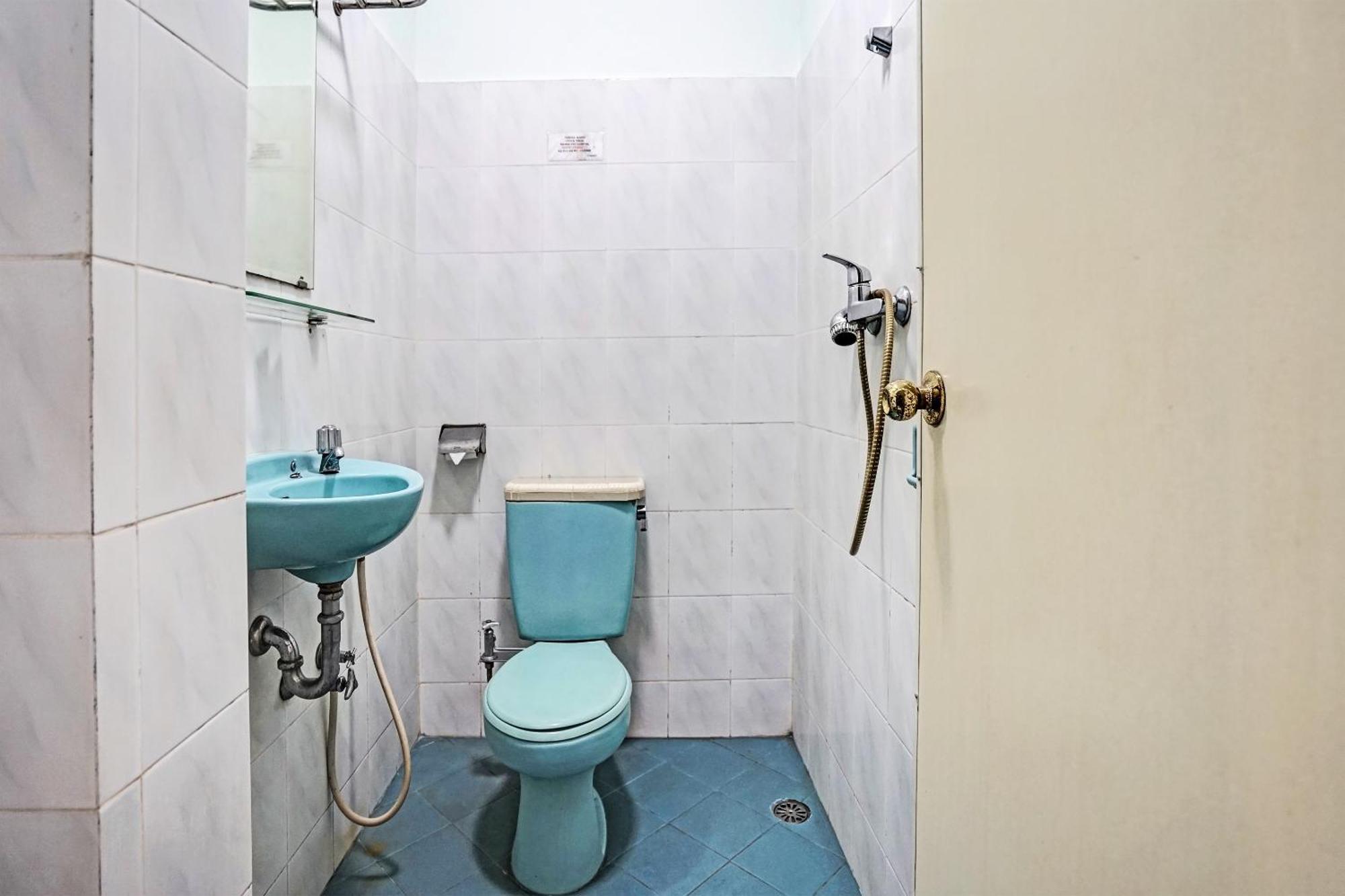 Super Oyo 91805 Hotel Wisma Bari Palembang Buitenkant foto