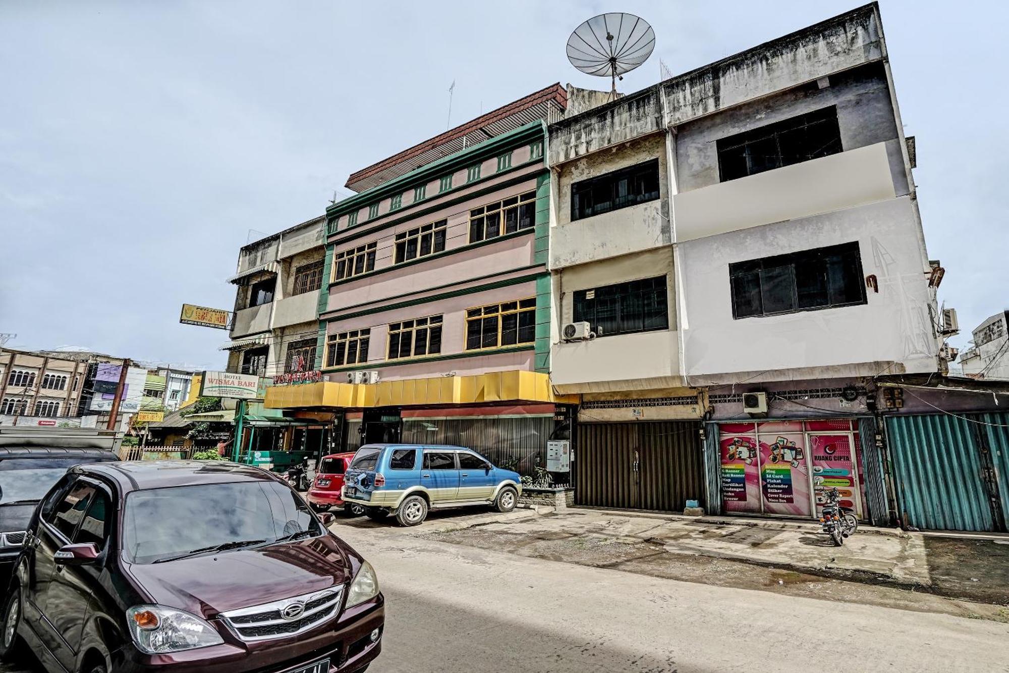 Super Oyo 91805 Hotel Wisma Bari Palembang Buitenkant foto