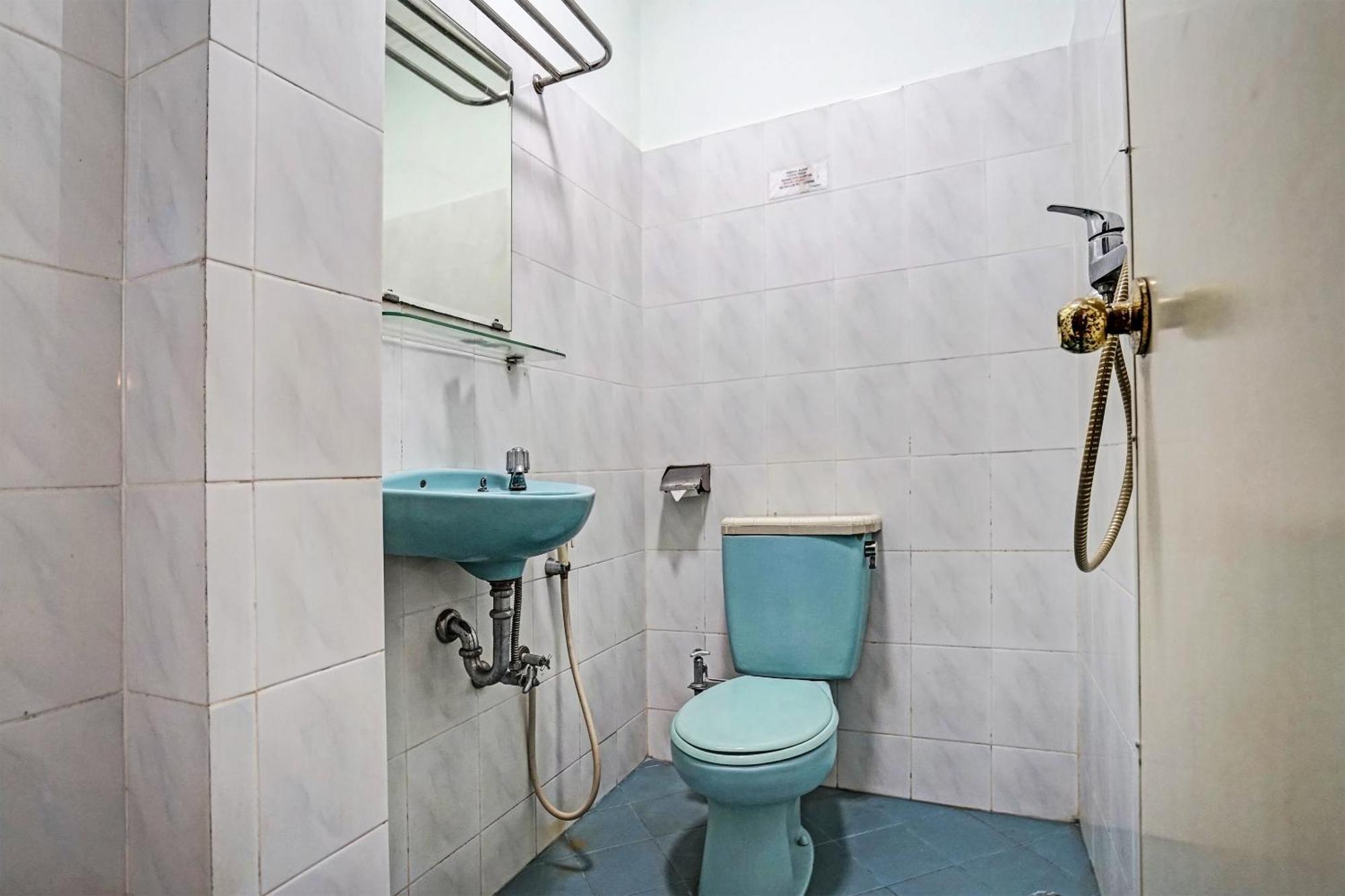 Super Oyo 91805 Hotel Wisma Bari Palembang Buitenkant foto