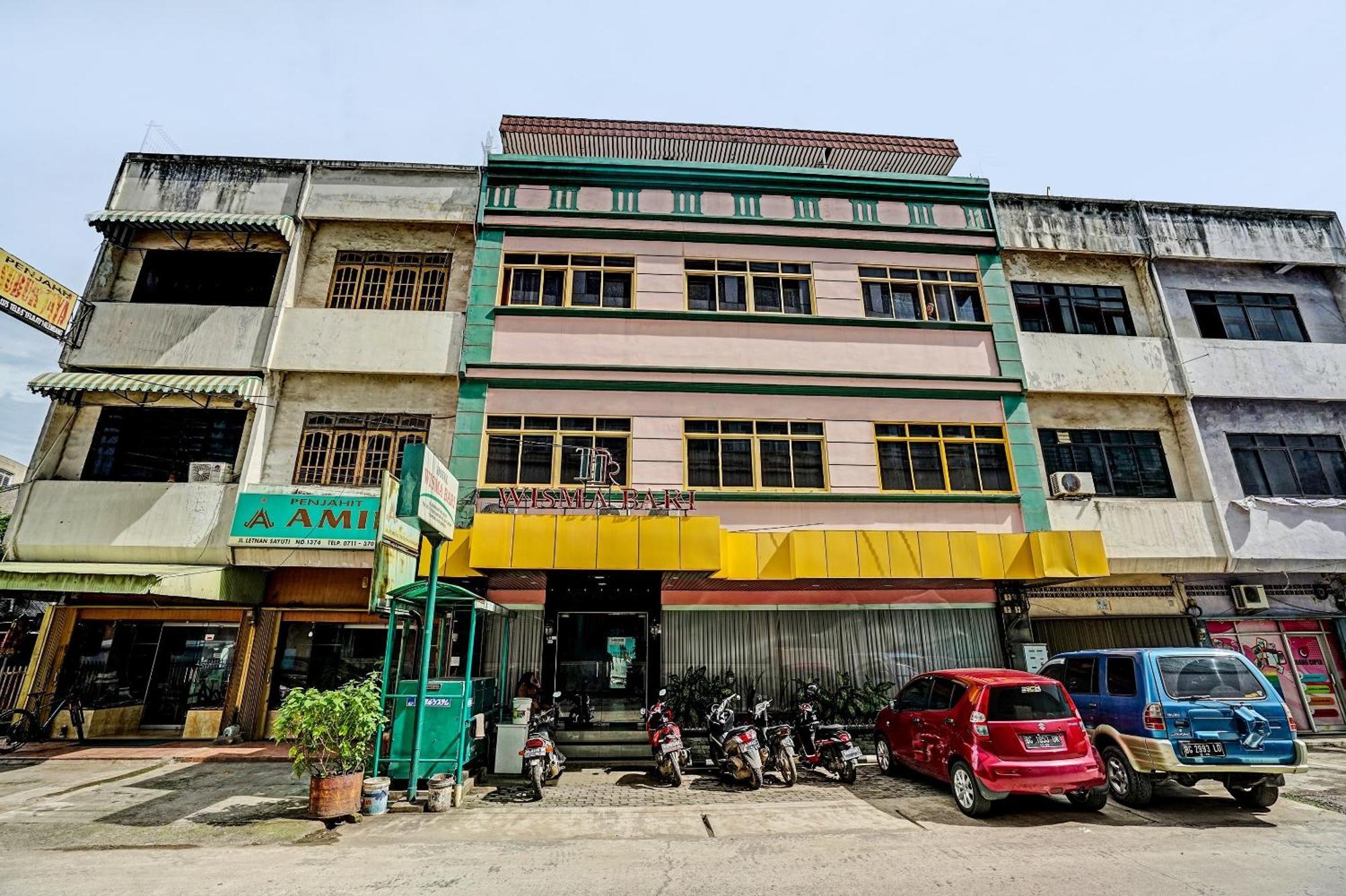 Super Oyo 91805 Hotel Wisma Bari Palembang Buitenkant foto